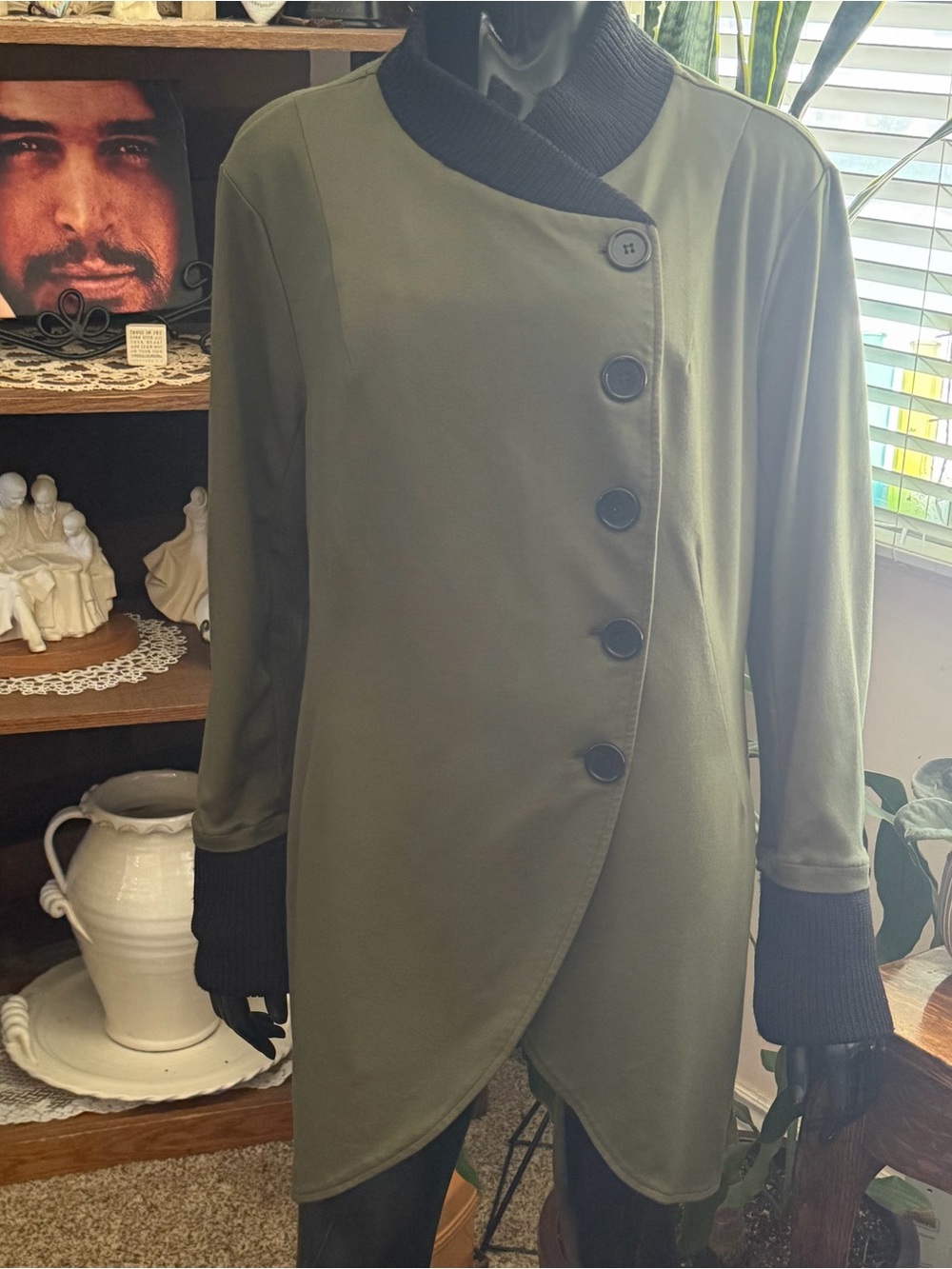 “VENUS” Asymmetrical Olive Green Jacket With Black Collar & Cuffs.       Size 20